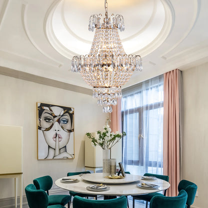 Gold K9 Crystal Chandelier with 7 lights illuminating a stylish living room, highlighting luxury design.