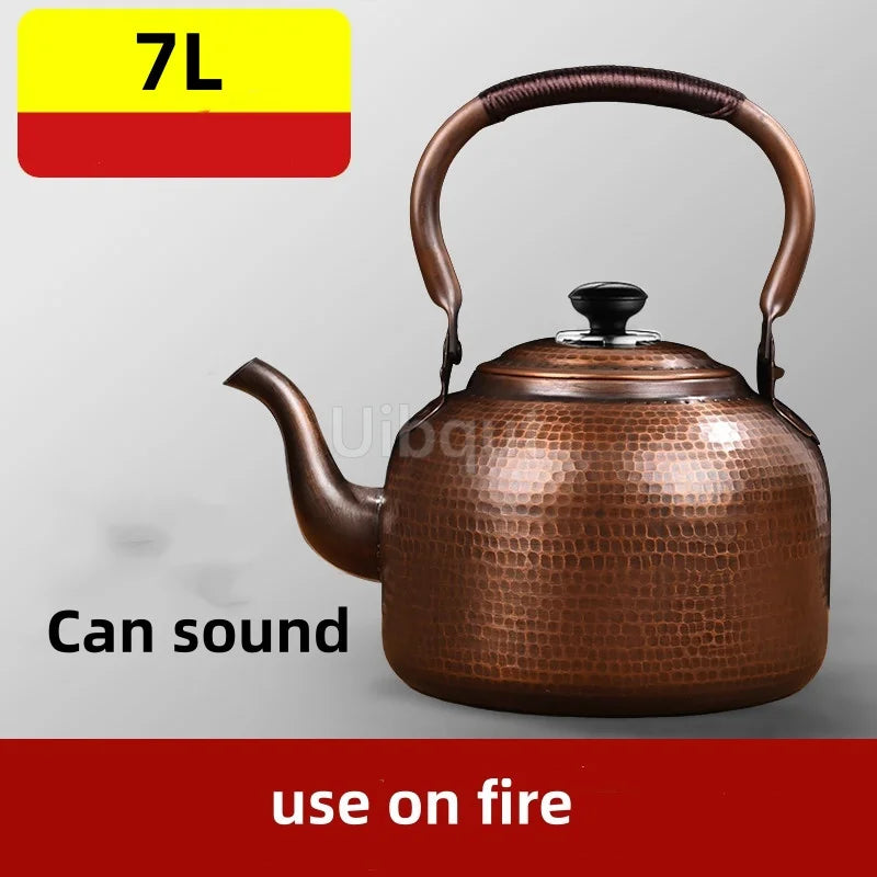 Copper Teapot 100% Pure Handmade – 5L capacity kettle displayed with ceramic cups and loose-leaf tea.