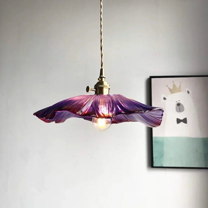 Artisan Lotus Leaf Shaped Glass Pendant Light showcasing customized colors and warm ambient glow as a beautiful lotus leaf pendant light.