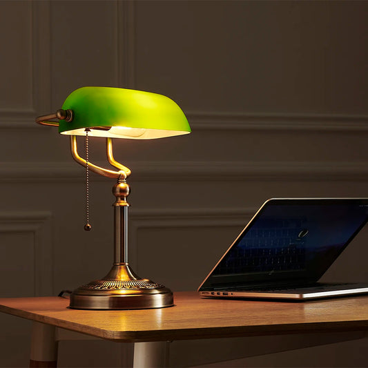 Stylish Vintage Bankers Table Lamp sitting elegantly on a bedside table, demonstrating its versatility in various home decor styles.