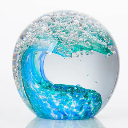 Hand-Blown Ocean Wave Glass Paperweight highlighting the vibrant colors and unique craftsmanship of this beautiful decorative piece.