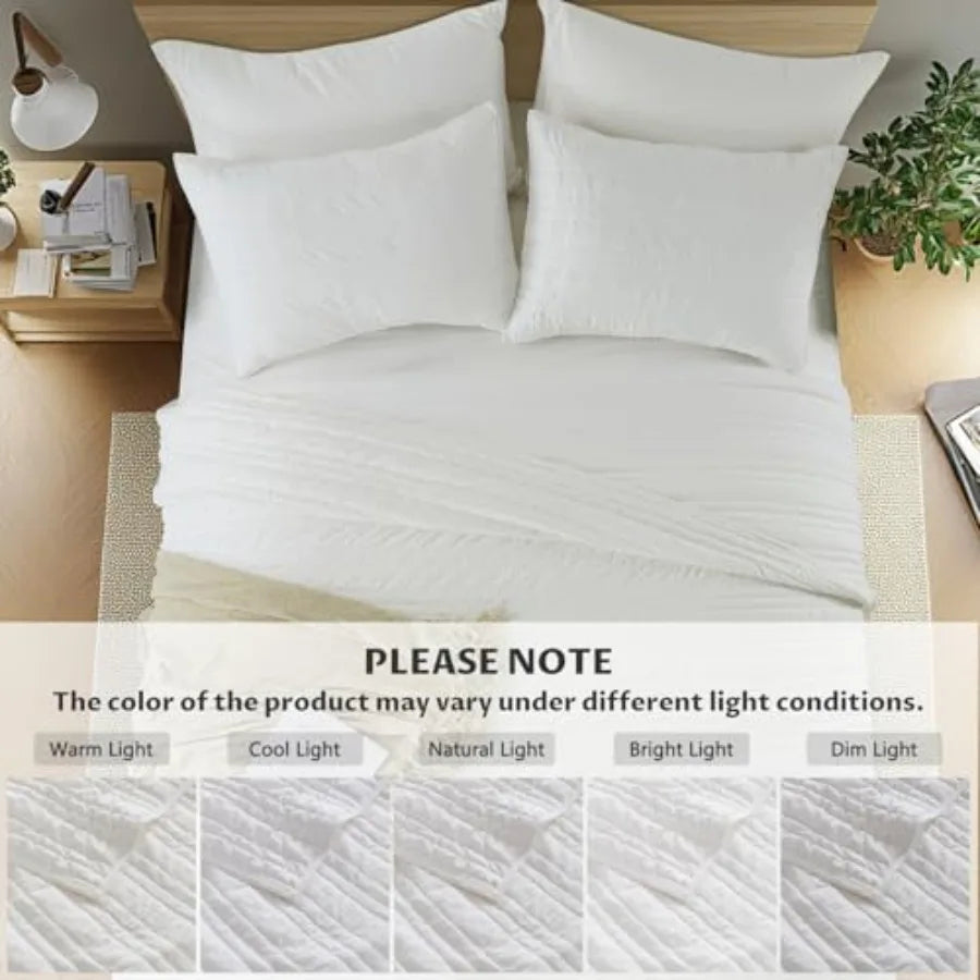 A beautifully arranged Elegant & Ultra-soft Queen Size 3-Piece White Velvet Quilt Set on a queen bed, perfect for year-round comfort and elegance.