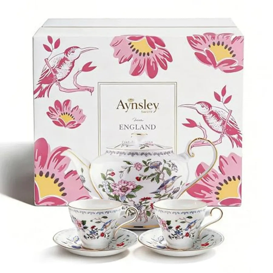 Intricate floral details of Aynsley Fine Bone China Tea Set featured during a cozy tea event.