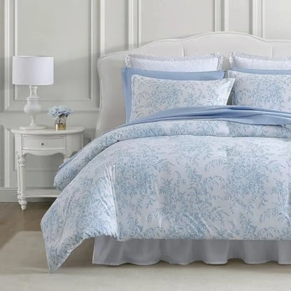 Reversible Bedford Blue Floral Comforter Set displaying the blue-and-white stripe design, offering versatility to your bedding style.