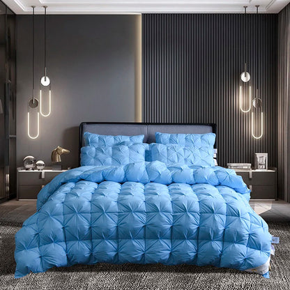 Warm and cozy Luxurious White Goose Down Comforter draped over a plush bed with soft pillows.