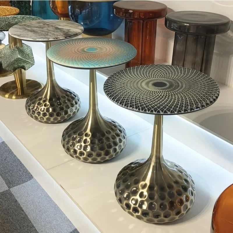 Artistic display of artisan top accent tables in a home office, combining function with modern decor.