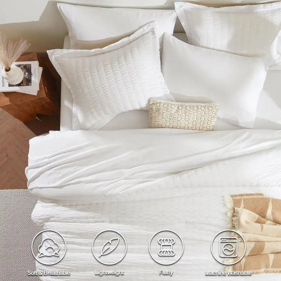 Cozy down alternative comforter from the 7-Piece Luxury Queen Bedding Set in Winter White, perfect for modern bedrooms.