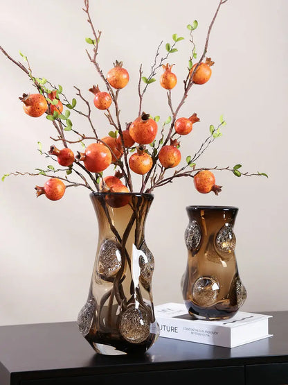 Decorative setup featuring the Coffee Art Glass Nordic Vase on a TV cabinet, emphasizing its modern glass vase characteristics.