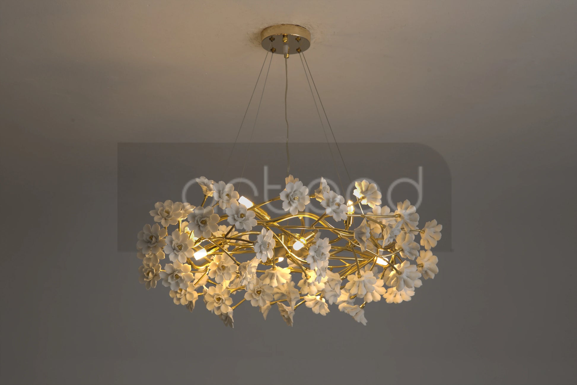 Elegant Gold Luxury Crystal Chandelier in a beautifully decorated entryway, perfect example of a decorative gold crystal chandelier.