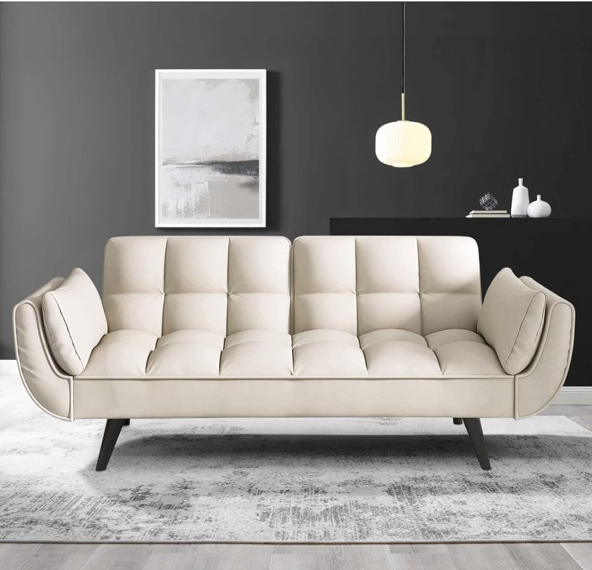The inviting setup of the 57" Velvet Convertible Futon Sofa adorned with cushions, perfect for lounging.