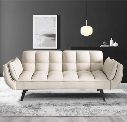 The inviting setup of the 57" Velvet Convertible Futon Sofa adorned with cushions, perfect for lounging.