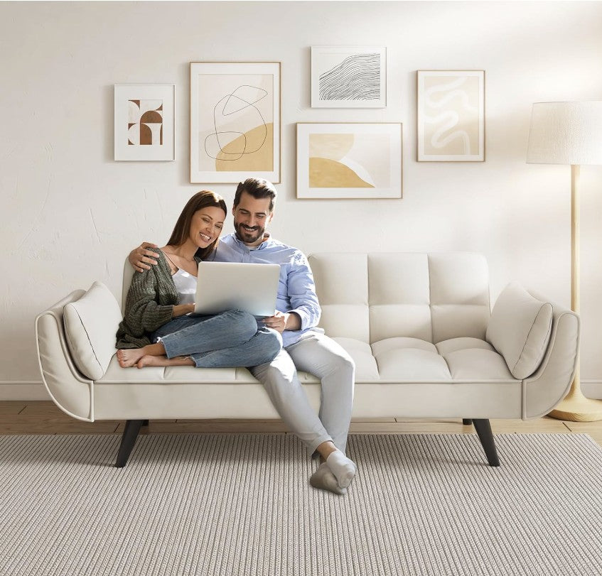 Showing versatility as a sleeper, the 57" Velvet Convertible Futon Sofa in a cozy apartment setting.