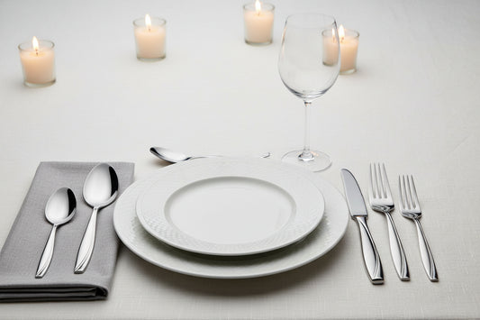 Comfortable to hold handle of the 20-Piece Modern Stainless Steel Flatware Set with Mirror Polished Finish, designed for an enjoyable dining experience.