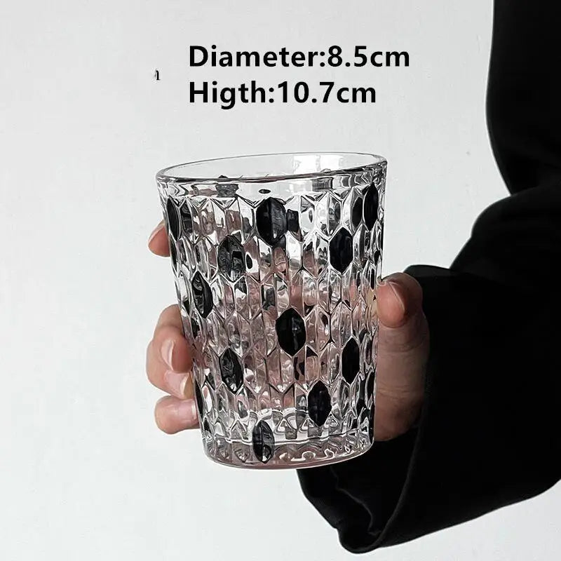 Hand-Carved 6-Piece Cut-Crystal Tumblers Set in transparent glass, perfect for casual or formal dining.