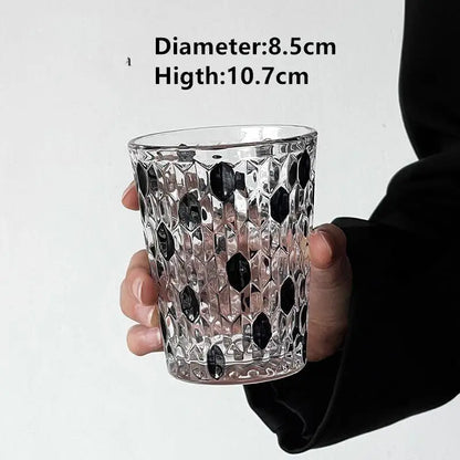 Hand-Carved 6-Piece Cut-Crystal Tumblers Set in transparent glass, perfect for casual or formal dining.