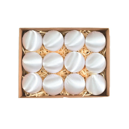 Elegant set of shatterproof satin silk ball ornaments displayed on a Christmas tree, showcasing their beauty and durability.