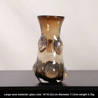 Coffee Art Glass Nordic Vase pictured with floral embellishment, illustrating its use as a modern glass vase in a home setting.