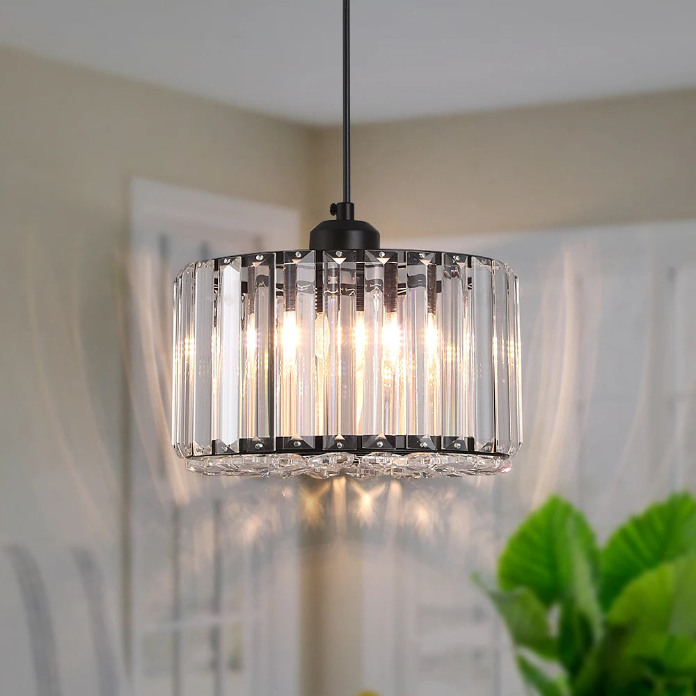 Stylish modern LED crystal pendant light illuminating a cozy corner, adding luxury to home decor.