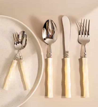 Flatware Set highlighting the rich olive green bamboo-inspired handles, making 18/10 stainless steel cutlery an essential for modern dining.