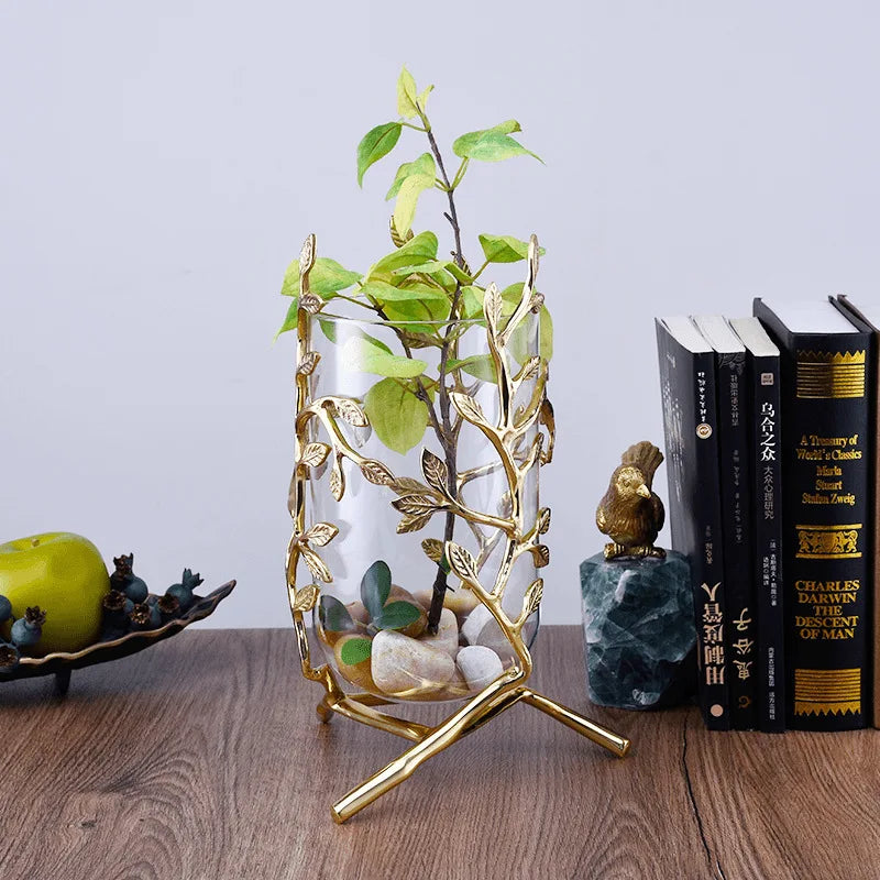 Elegant Clear Glass Vase with Gold Metal Branches in a modern setting, designed to enhance home decor and function.