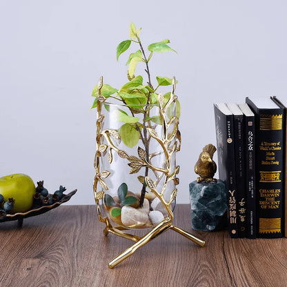 Elegant Clear Glass Vase with Gold Metal Branches in a modern setting, designed to enhance home decor and function.