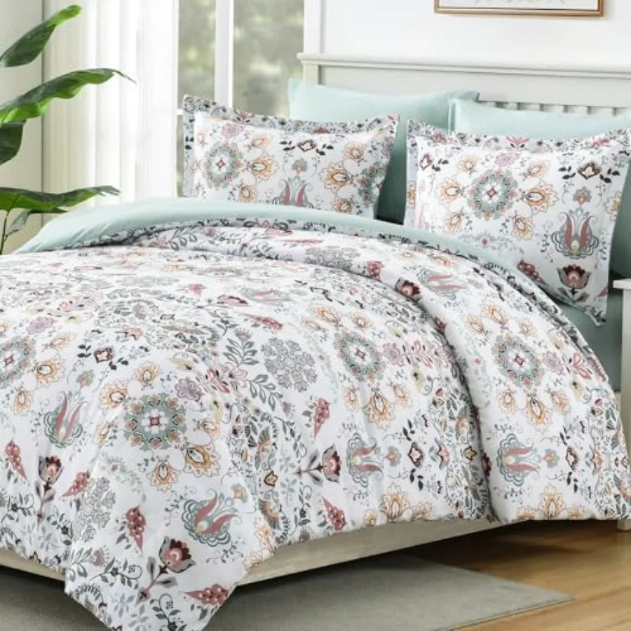 Cozy view of the Boho Floral Comforter Set placed on a queen bed, featuring light green microfiber and elegant floral patterns.