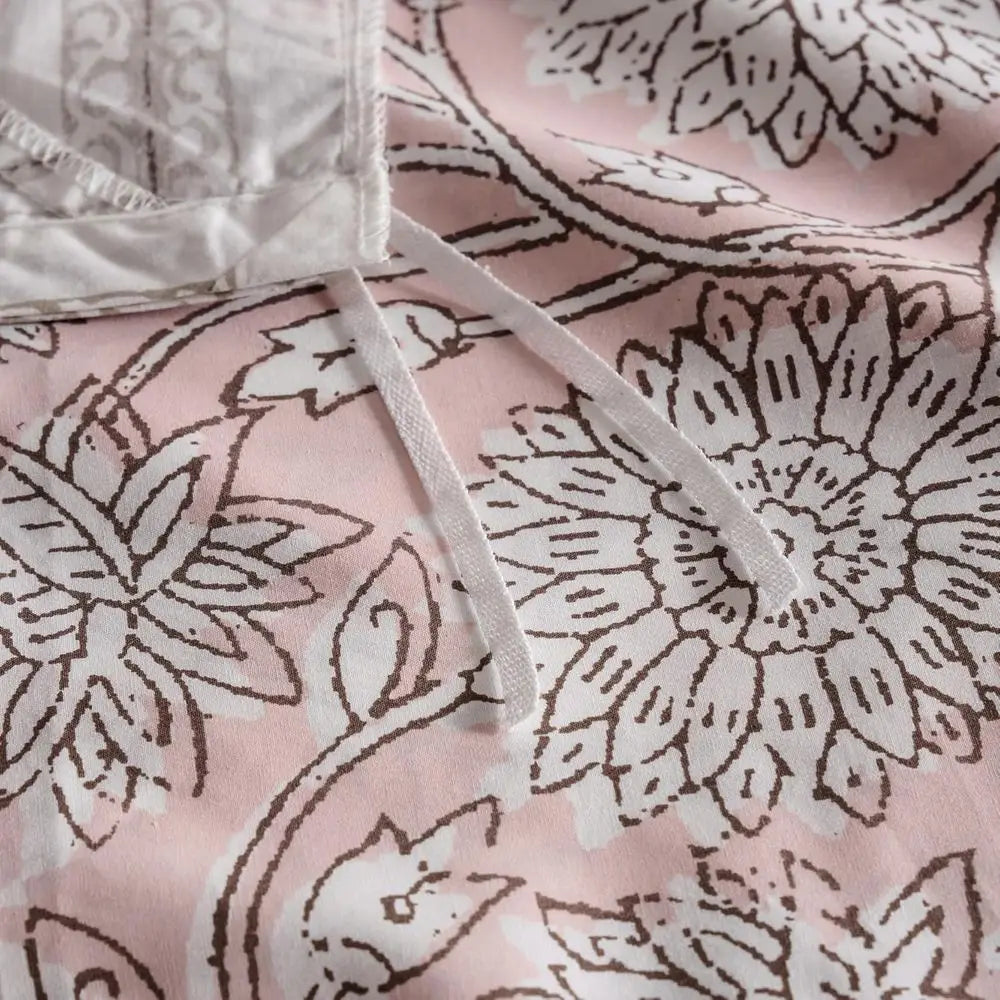 Machine washable queen size cotton reversible comforter set designed for easy care and luxurious comfort.