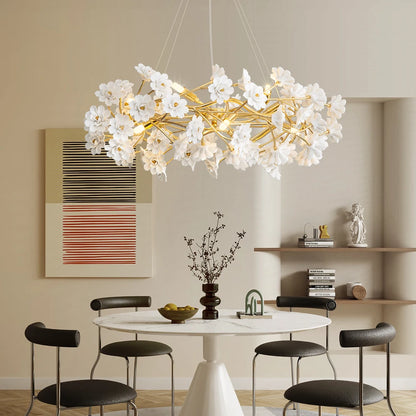Elegant Gold Luxury Crystal Chandelier standing out in an adorned living area, a stylish representation of a luxurious gold crystal chandelier.