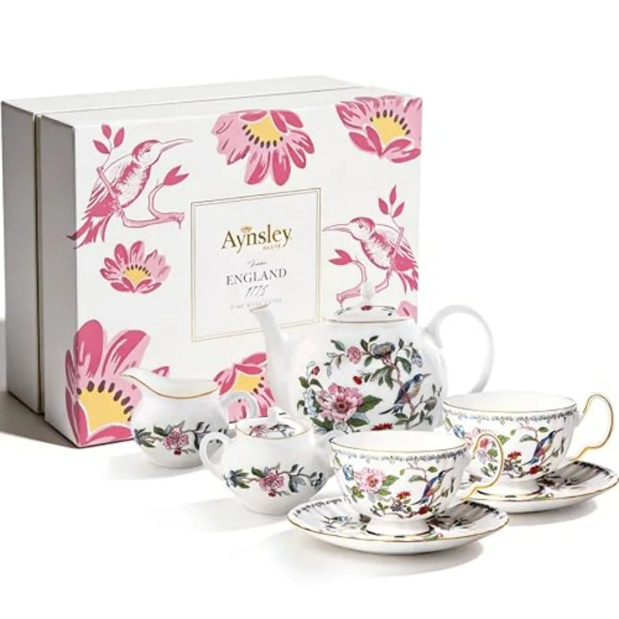 Exquisite Aynsley 7-Piece Tea Set positioned on a dining table, exuding luxury and charm.