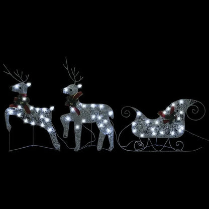 Outdoor Silver Reindeer & Sleigh Christmas Decoration w/60 LED Lights illuminating a front yard, featuring the delightful silver reindeer decoration to spread holiday cheer.