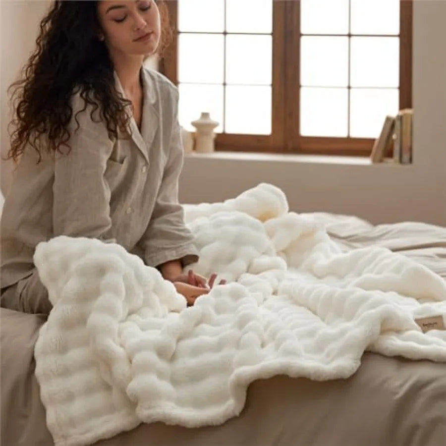 50x60 Off-White 3D Fleece Bubble Throw Blanket displayed on a neutral bedroom bed