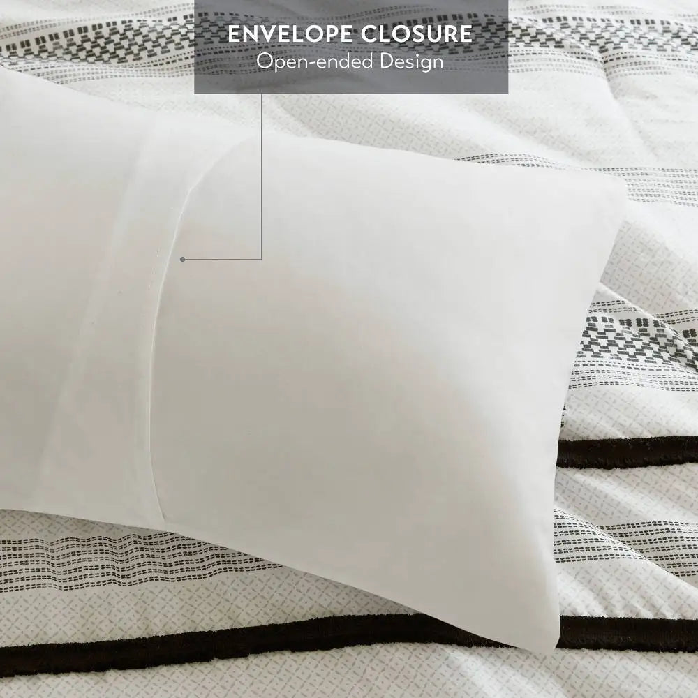 Cozy 7-piece king size comforter set featuring a chic black & white stripe pattern, ideal for updating your bedroom.