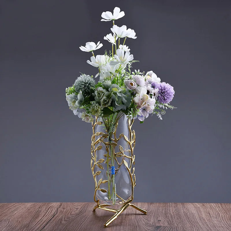 Stylish Elegant Clear Glass Vase with Gold Metal Branches, perfect for displaying fresh flowers in modern decor.