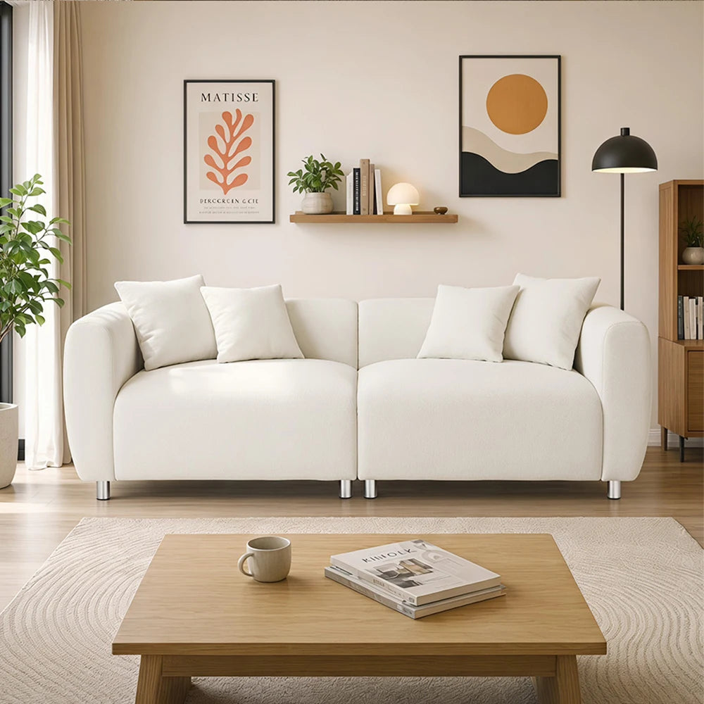 The 89" Luxury Cotton Linen Sofa adorned with neutral-toned throws, enhancing its sophisticated look.