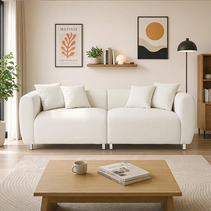 The 89" Luxury Cotton Linen Sofa adorned with neutral-toned throws, enhancing its sophisticated look.