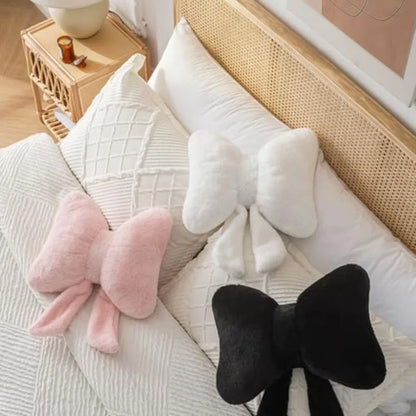Close-up of Pink Bow Throw Pillow showing plush faux rabbit fur texture, ideal for chic bedroom decor.