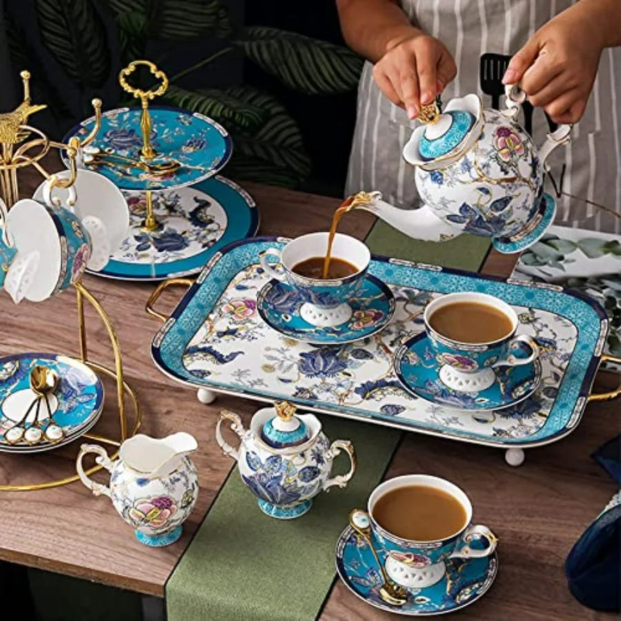 Vintage Bone China Tea Cup and Saucer Set featuring a blue and white floral design with gold rim.