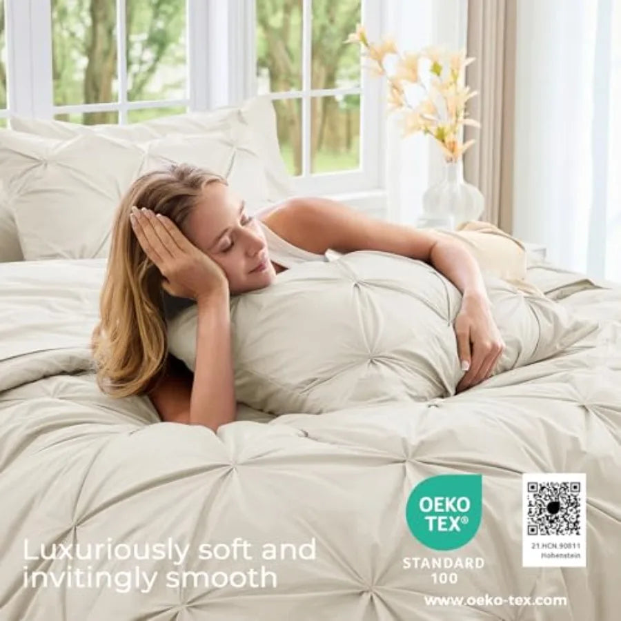 Transform your bed with this stylish Queen comforter set, featuring a luxury pinch pleat design that adds sophistication to your sleeping space.