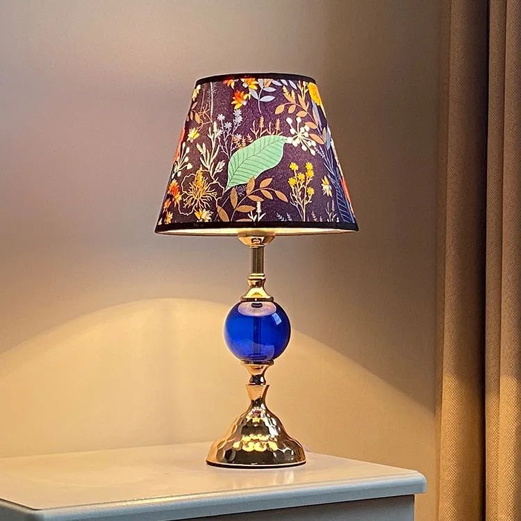 The charming Warm Romantic Touch Switch Bedside Lamp adds warmth to a bedroom - a decorative yet functional modern bedside lamp