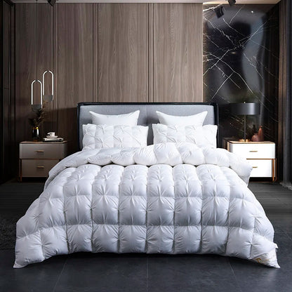 Luxurious White Goose Down Comforter surrounded by fluffy pillows, creating a comfortable sleep environment.