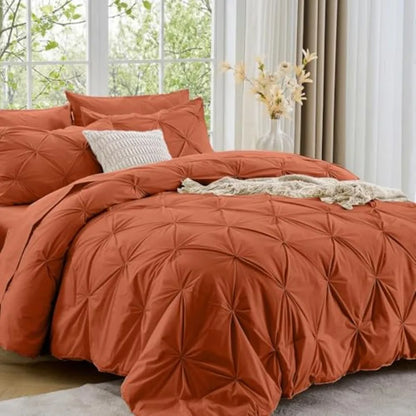 Add an elegant flair to your bedroom with the Queen comforter set, featuring stunning pintuck details for a luxurious aesthetic.