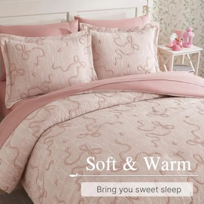 Close-up of Luxury Blush Pink Bowknot Comforter Set showcasing soft jacquard fabric, ideal blush pink comforter set for comfort and style.