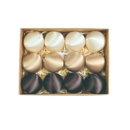 Showcasing the exquisite details of shatterproof satin silk ball ornaments, perfect for homes with kids or pets during the holiday season.