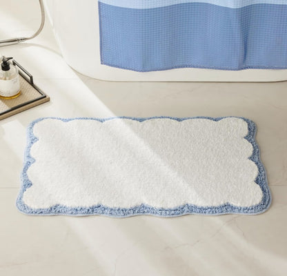 Aerial view of 20 x 30 Cotton Bath Rug featuring its soft texture and charming scalloped design