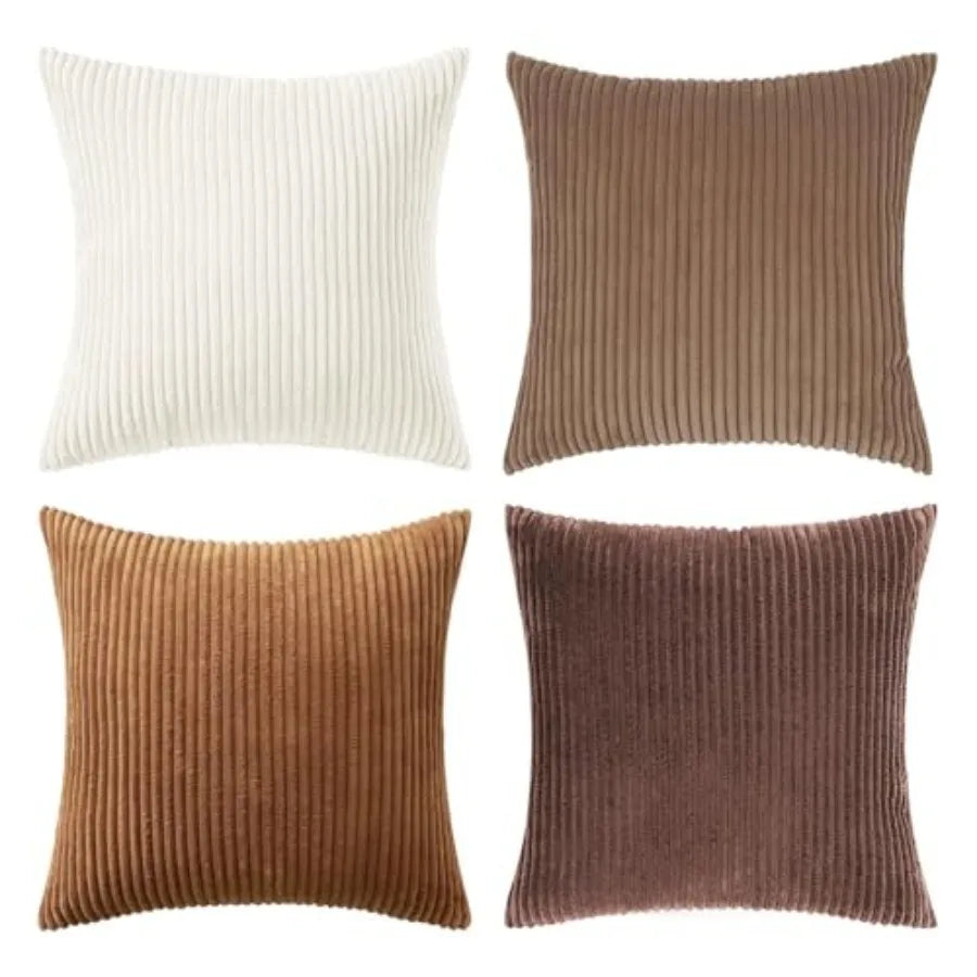 Four ribbed texture throw pillows in different brown shades on a white background