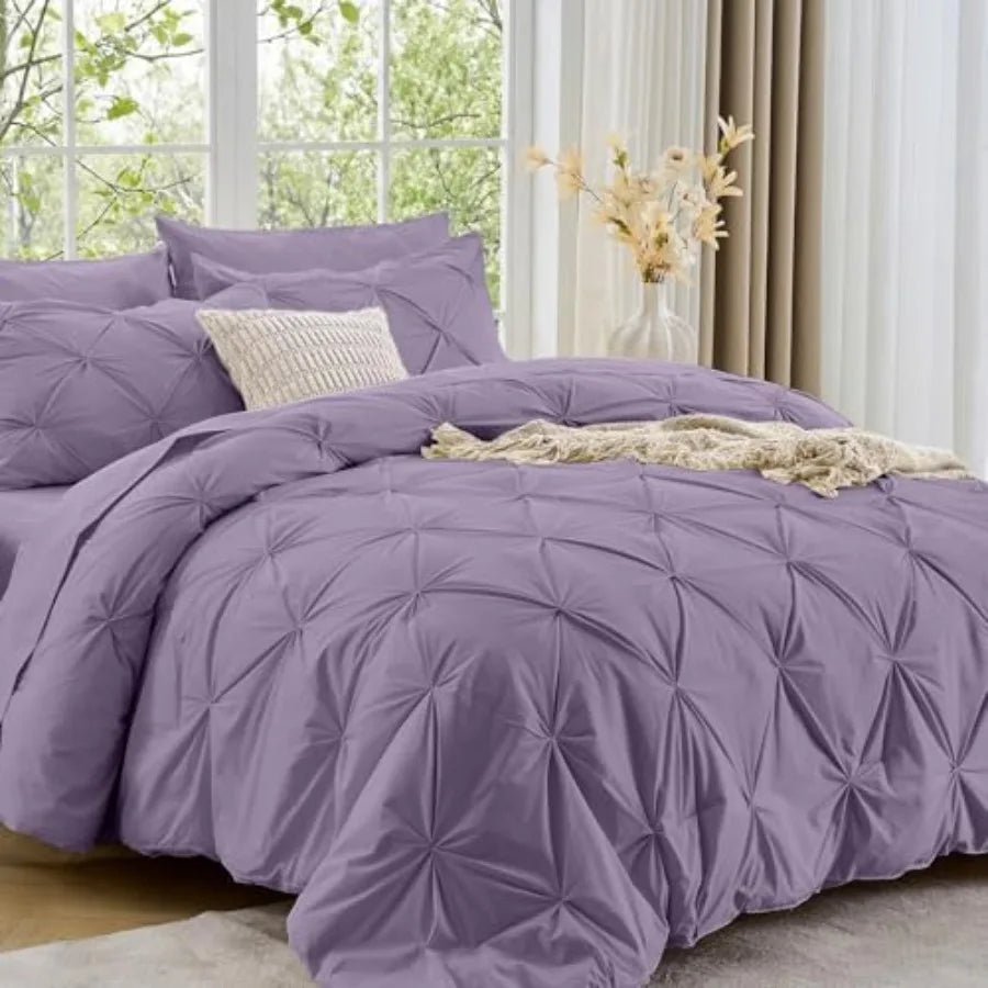 This Queen 7-Piece Pintuck Comforter Set is the ultimate bedding upgrade, merging elegant design with soft, durable materials for lasting comfort.