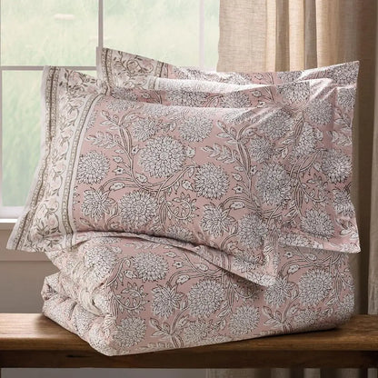 Reversible comforter set made from 100% cotton with stylish botanical motifs, ideal for enhancing bedroom decor.