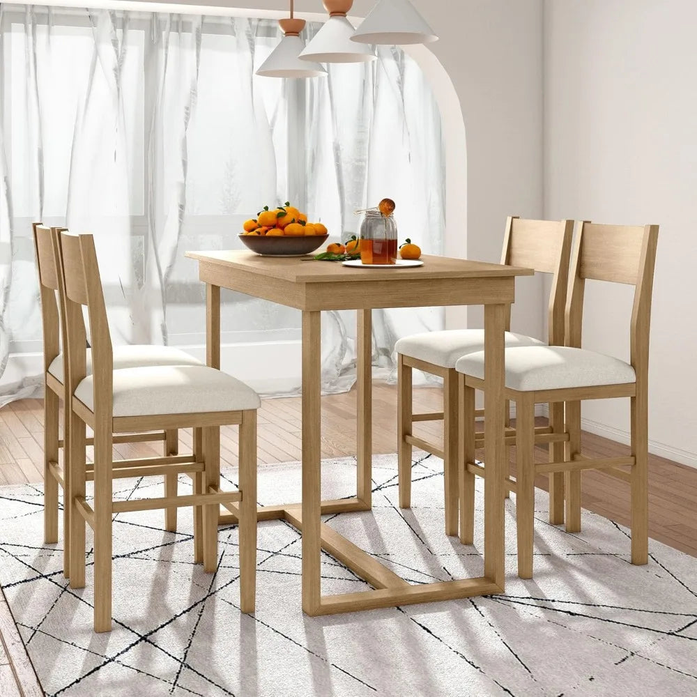Dining table set with four chairs in a room with light curtains and a patterned rug.