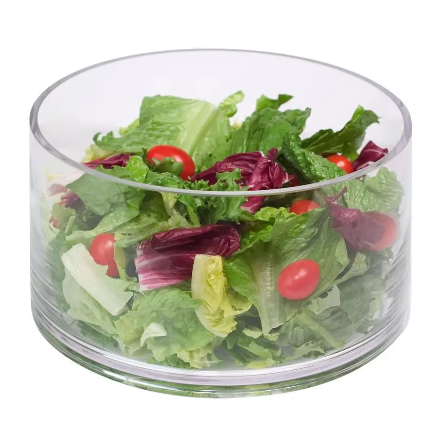 Beautifully set 9" Clear Handcrafted Glass Salad Bowl surrounded by colorful dishes, showcasing its versatility and style.