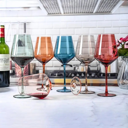 Art Deco wine glasses displayed with assorted wines, demonstrating their versatility for both red and white wines.